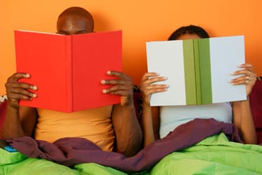 getty_rf_photo_of_couple_reading_in_bed.jpg?resize=375px:250px&output-quality=50