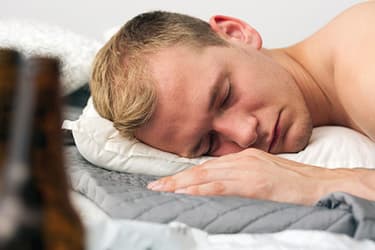 493ss_thinkstock_rf_man_sleeping_in_bed_after_drinking.jpg?resize=375px:250px&output-quality=50
